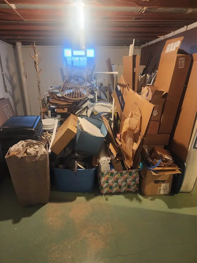 Roll-off dumpster container at job site for 2 Yard Dumpster Rental in Bonne Terre